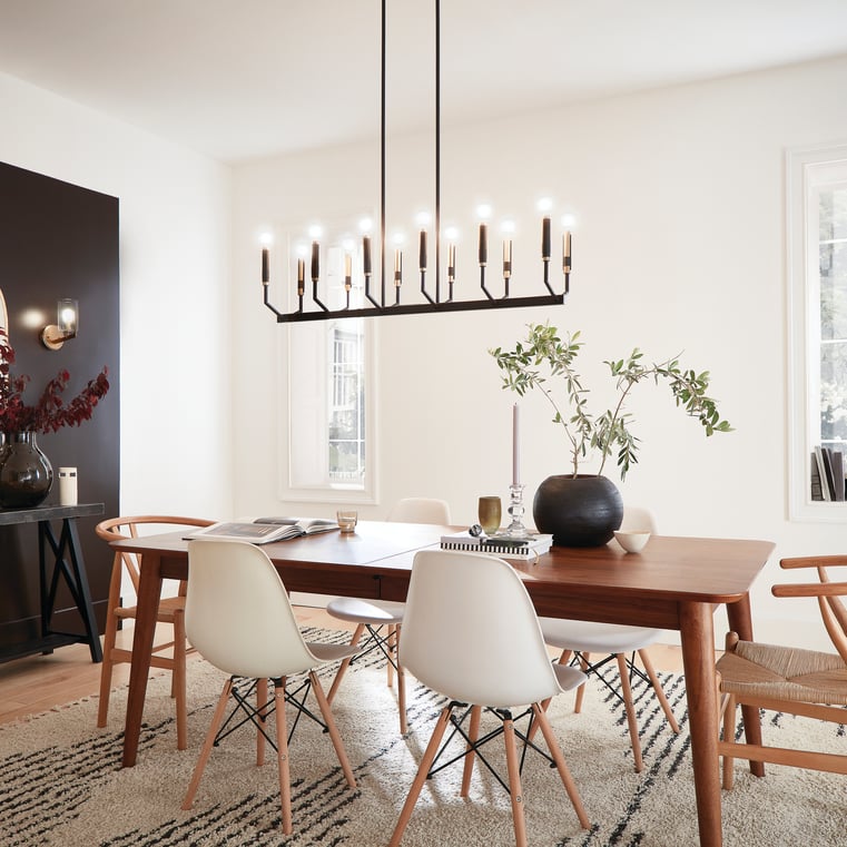 black and gold kichler linear chandelier in dining room
