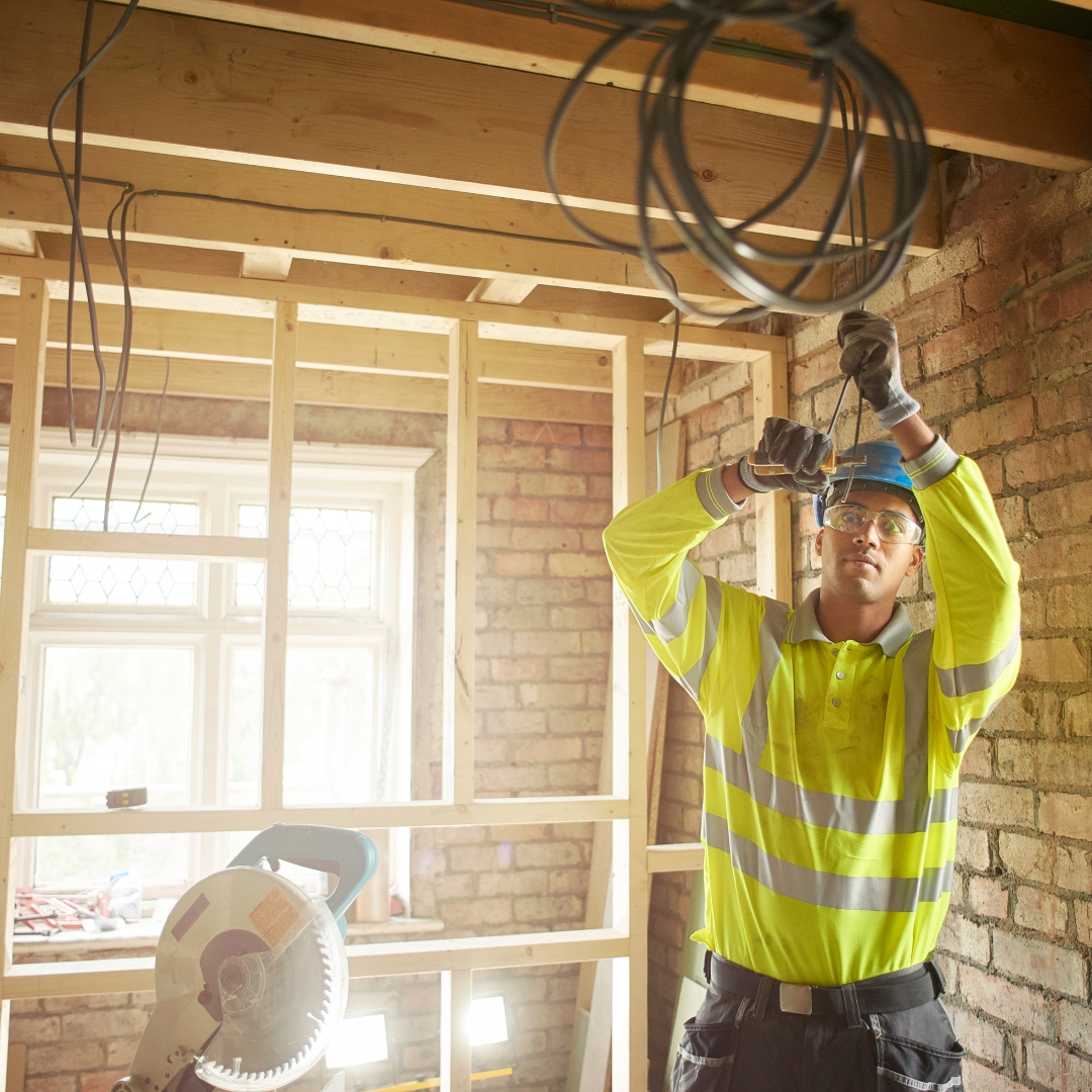 electrician wiring a building